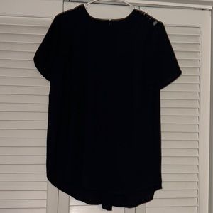 navy blue blouse with buttoned lace back panel and semi-sheer front panel